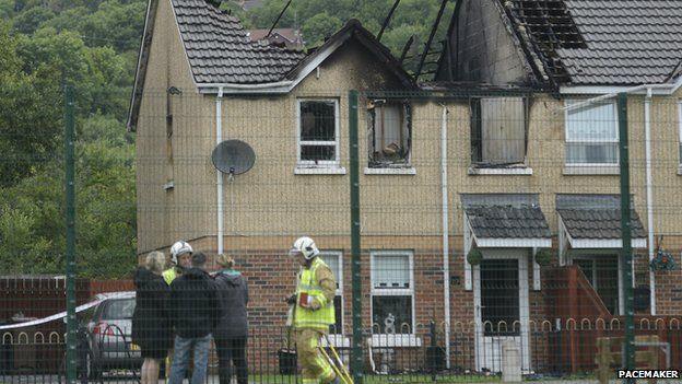 Witnesses said flames could be seen billowing through the house from miles away