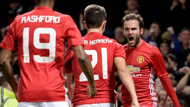 Juan Mata celebrates