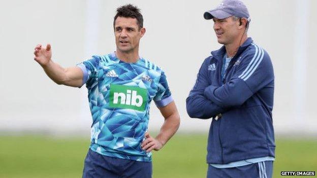 Dan Carter with Blues coach Leon McDonald during a training session on Thursday