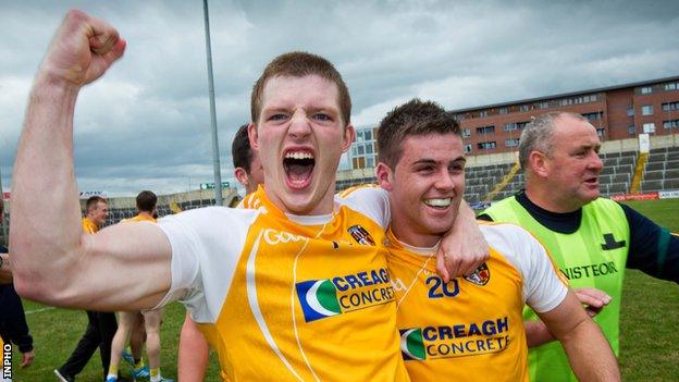 Owen Gallagher celebrates with Paddy McBride after Antrim's sensational win