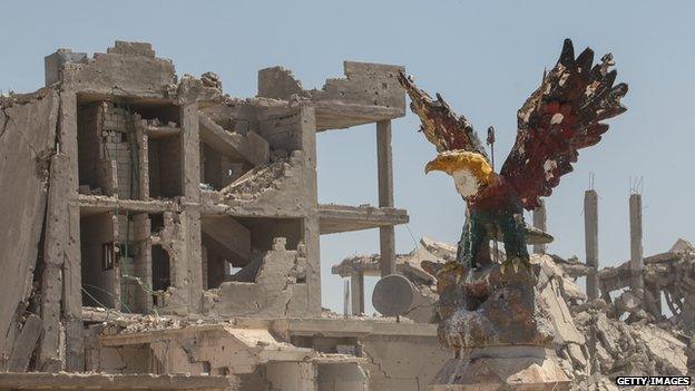 Wreckage left by fighting on a street in the centre of the Syrian town of Kobane, also known as Ain al-Arab, Syria.