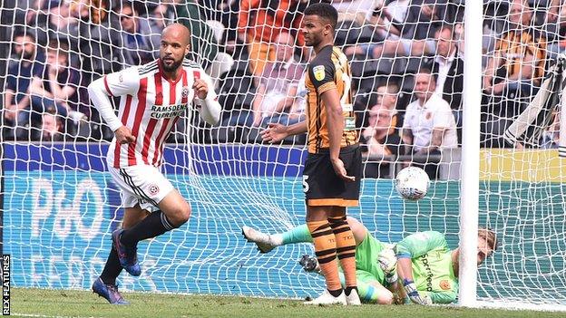 David McGoldrick celebrates scoring his first goal against Hull City