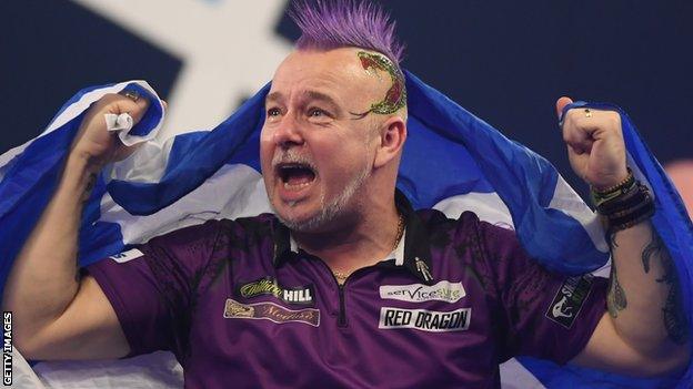 Peter Wright celebrates winning the PDC World Championship