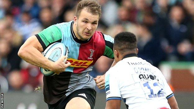 Andre Esterhuizen carries the ball forward for Harlequins