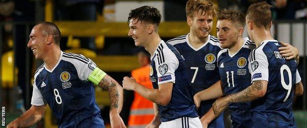 Celtic's Scott Brown, Kieran Tierney, Stuart Armstrong, James Forrest and Leigh Griffiths celebrate for Scotland against Lithuania