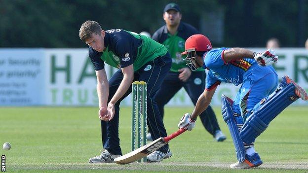 Najibullah Zadran attempts to avoid being run-out by Ireland's Peter Chase in last Tuesday's game at Stormont