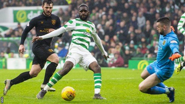 Livingston's Liam Kelly saves from Celtic's Odsonne Edouard