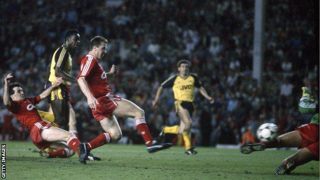 Michael Thomas scores Arsenal's last-minute title-winning goal against Liverpool at Anfield in May 1989