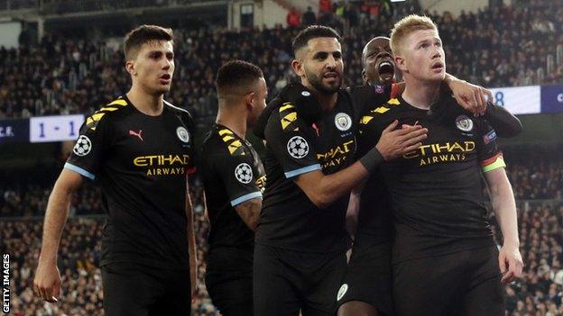 Manchester City players celebrate a goal against Real Madrid