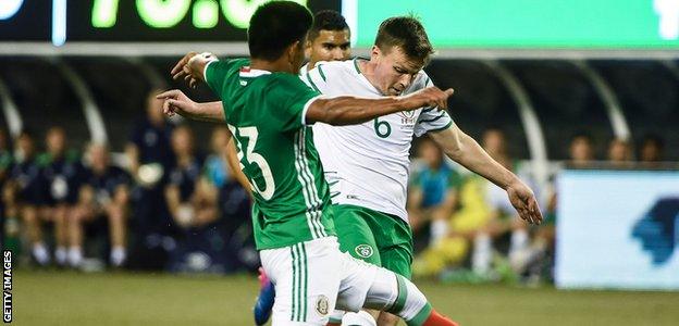 Stephen Gleeson (right) in action for Republic of Ireland