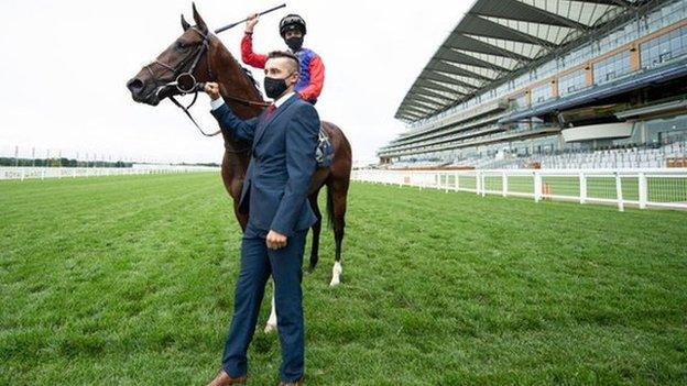 James Doyle, who won earlier on Lord North, celebrates with Tactical