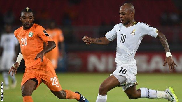 Serey Die of Ivory Coast challenges Ghana's Andre Ayew in the 2015 AFCON final