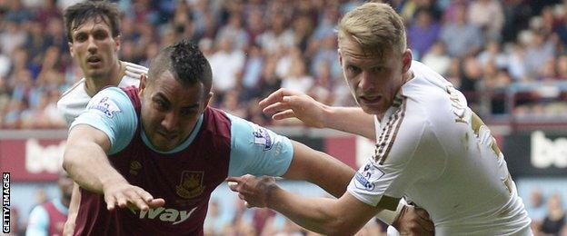 Stephen Kingsley (right) in action for Swansea City