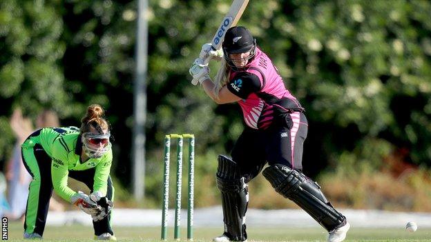 New Zealand debutant Jess Watkin prepares to strike the ball on her way to an unbeaten 77 against Ireland