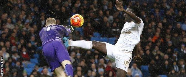 Joe Hart and Bafetimbi Gomis