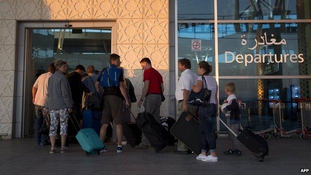 Tourists leaving Tunisia at the Enfidha International airport