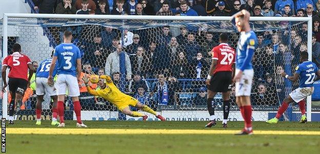 Omar Bogle has his penalty saved by Barnsley keeper Adam Davies