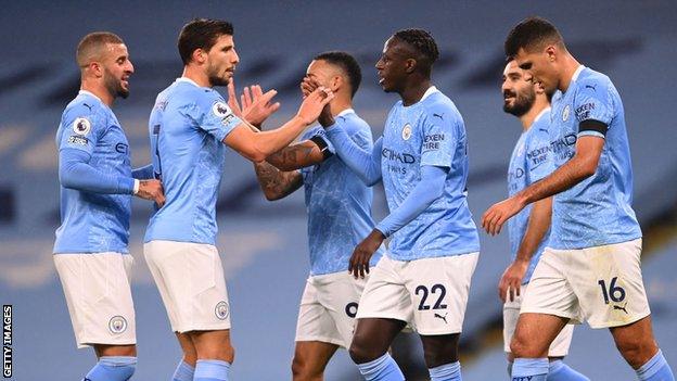 Manchester City players celebrate