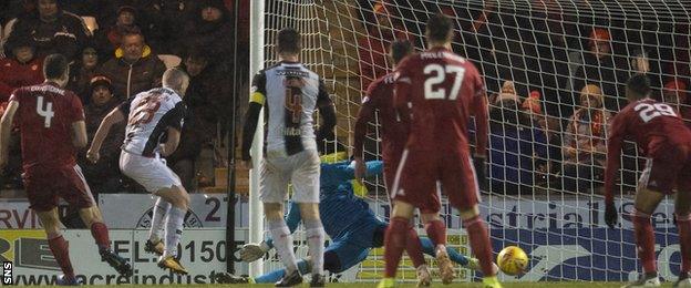 Cameron MacPherson (second left) pounces inside the box to steer St Mirren level