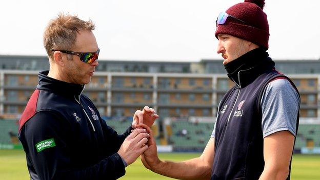 Stuart Barnes gives some bowling tips in his coaching role at Somerset