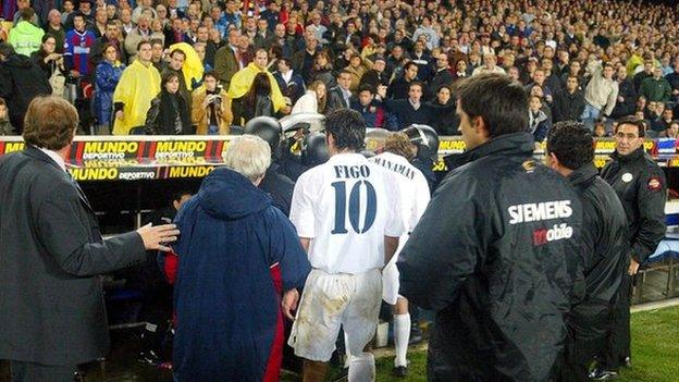Figo leaves the pitch at full-time