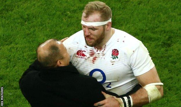 Eddie Jones and James Haskell celebrate the Slam