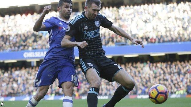 Diego Costa and Gareth McAuley