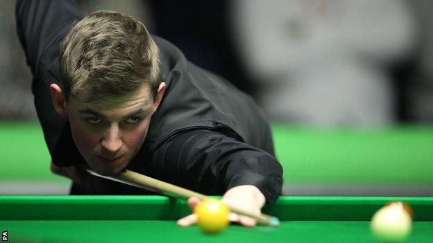 James Cahill takes a shot