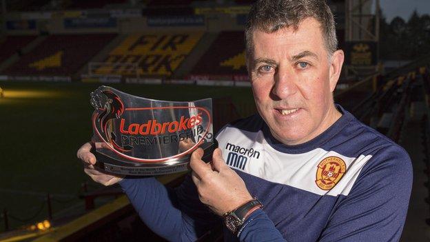 Motherwell's Mark McGhee with his manager of the month award