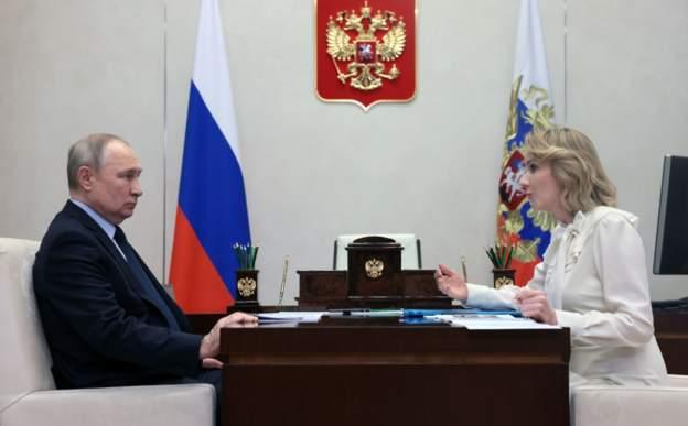 Vladimir Putin and and Maria Lvova-Belova