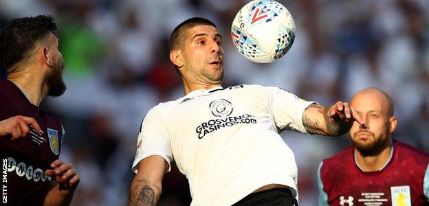 Aleksandar Mitrovic tries to control the ball in the play-off final against Aston Villa