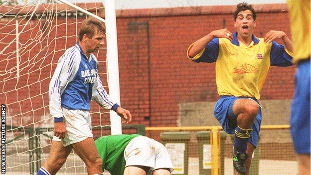 Darren Ryan (right) celebrates a goal for Barry against Ebbw Vale