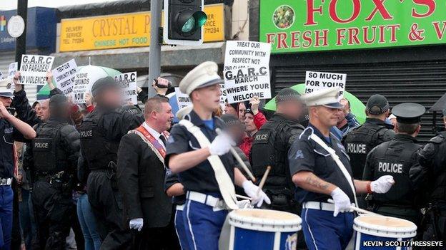 The outward leg of the Orange Order parade in north Belfast passed off without incident