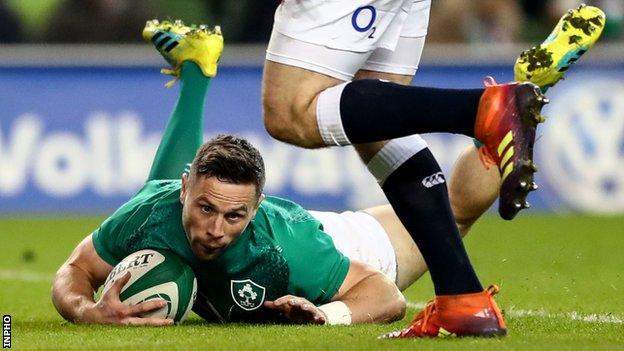 John Cooney scores a try for Ireland in the final minutes of their defeat by England