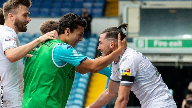 Harrison (right) scored six league goals last season