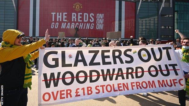 Supporters protest against Manchester United's owners outside Old Trafford