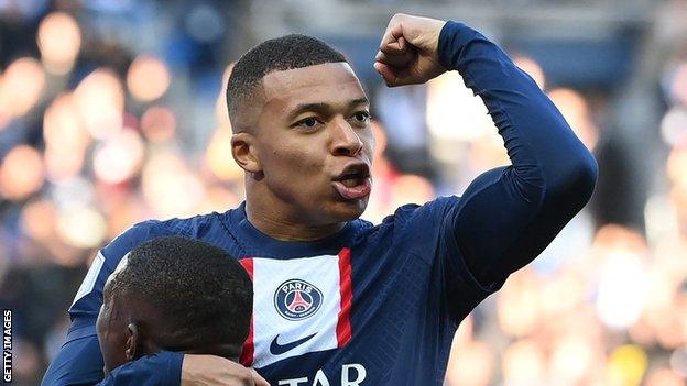 Paris St-Germain's Kylian Mbappe celebrates scoring the first goal in Ligue 1 match v Auxerre