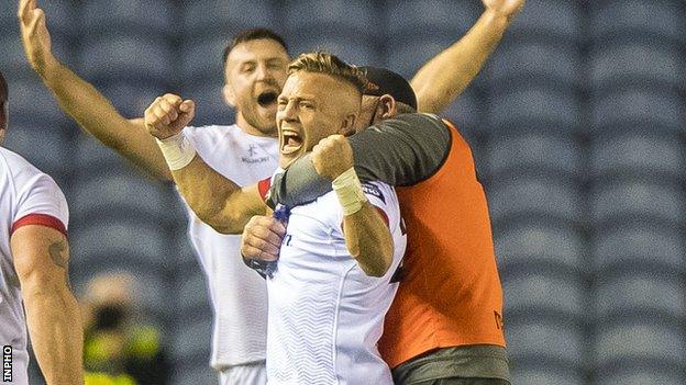 Ian Madigan celebrates with team-mates after winning the match against Edinburgh with the final kick of the game