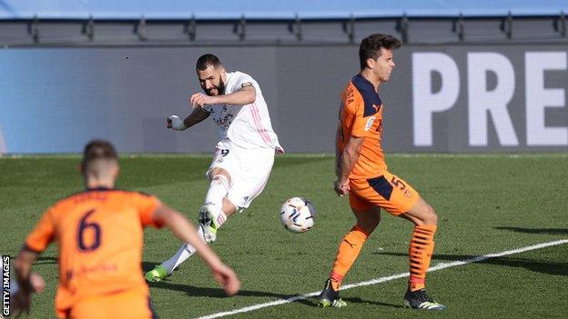 Karim Benzema scores against Valencia