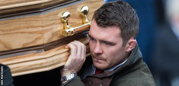 Peter O'Mahony carries the coffin at Anthony Foley's funeral