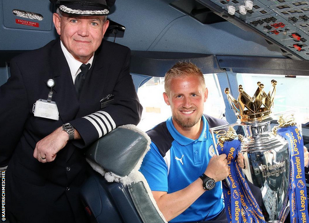 Kasper Schmeichel with the Premier League trophy