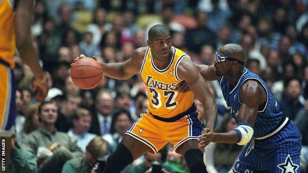 Magic Johnson playing for the Los Angeles Lakers