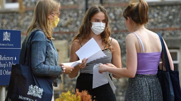 A-level students collecting their results