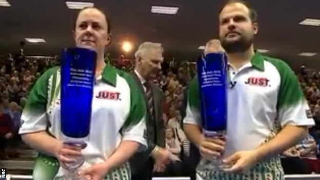 Lesley Doig and Jamie Chestney with their World Indoor trophies