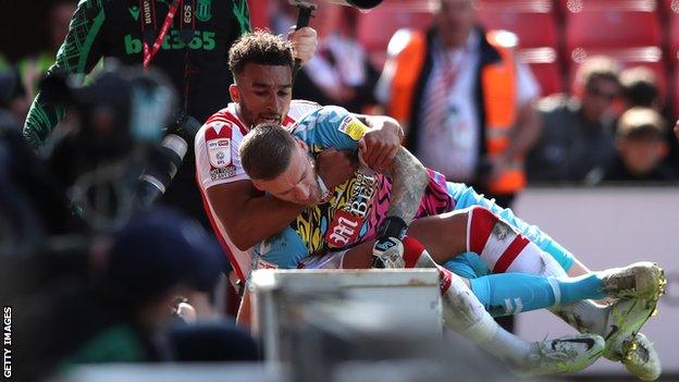 Stoke's Jacob Brown and Bristol City's Dan Bentley