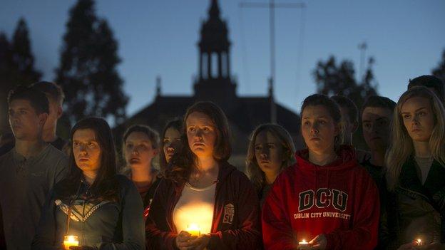 A candlelit vigil has been held in memory of the students who died