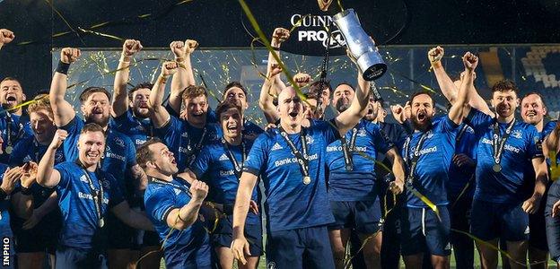 Leinster's Devin Toner holds the Pro14 trophy aloft