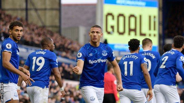 Richarlison celebrates Everton's opening goal against Chelsea