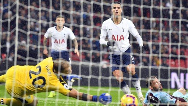 Joe Hart (left) saves from Erik Lamela