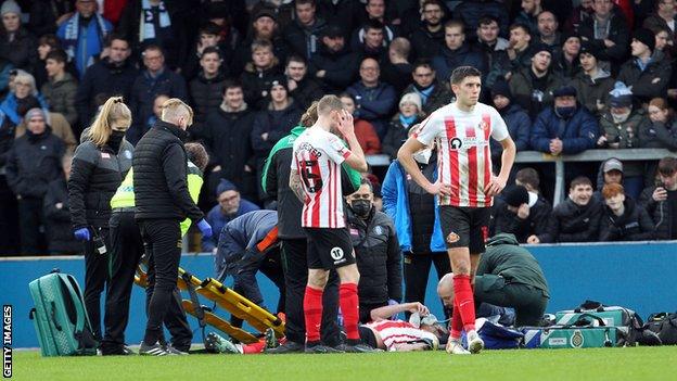 Corry Evans receives treatment